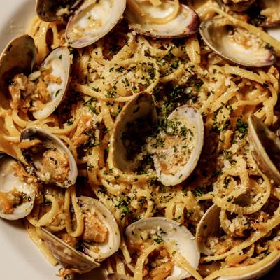 Linguine alle Vongole with clams, fresh parsley and Parmesan cheese.