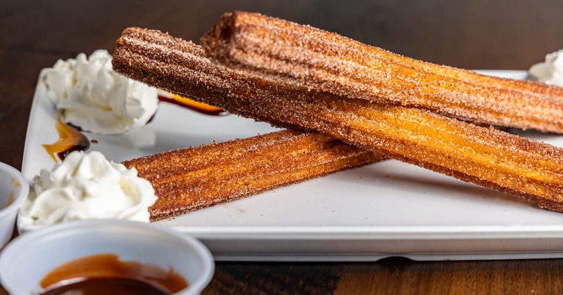 A plate with churros