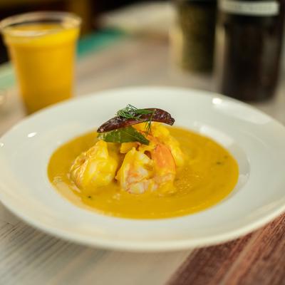Shrimp in a creamy mango sauce.