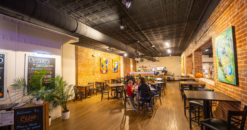 Interior, wide open seating area with few guests