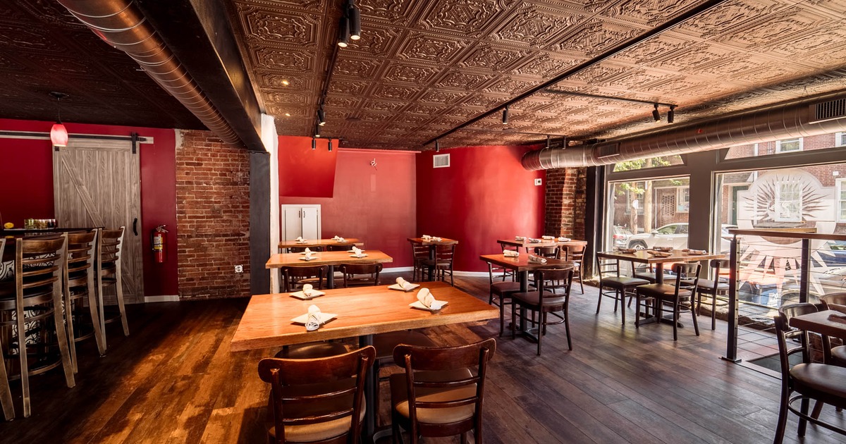 Interior, set dining tables ready to receive guests