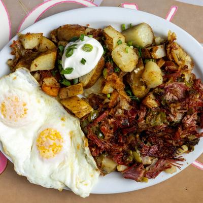 Corned beef hash and two fried eggs.