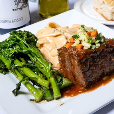 Fileto Il Sugo, Filet mignon served with mashed potatoes and broccolini.