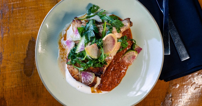 Grilled chicken with arugula, radish, and red sauce