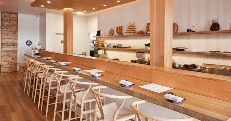 Dining counter set with plates and bar chairs