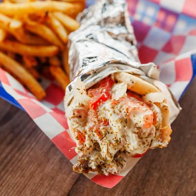 Gyro Wrap with a side of fries, close-up.