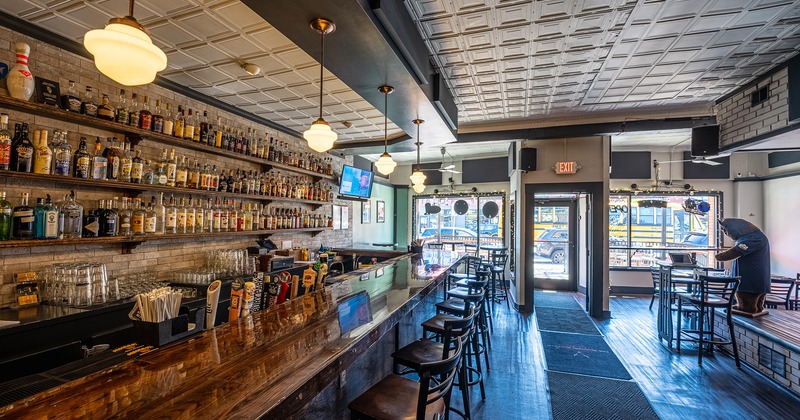 Interior, seating area and bar with bar stools