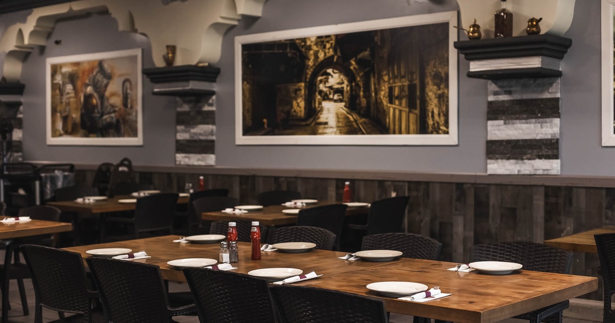 Interior, table for eight with big picture on the wall