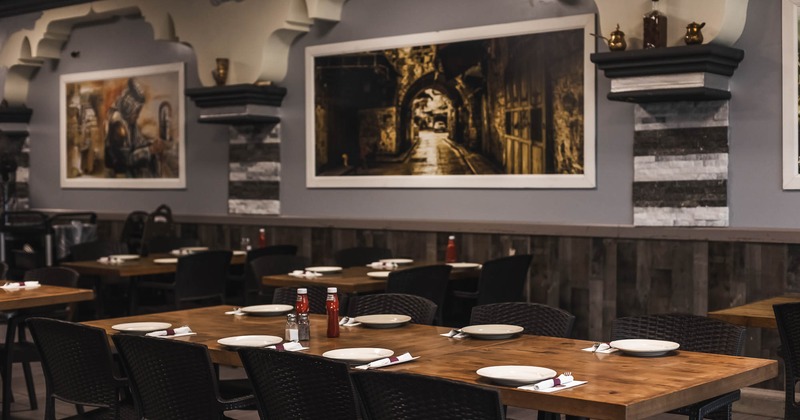 Interior, table for eight with big picture on the wall