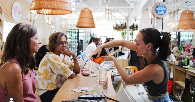 Bartender serving guests