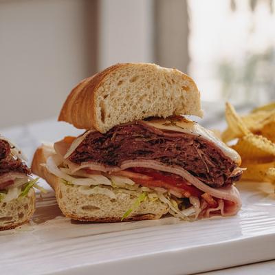 Served sandwiches and potato chips.