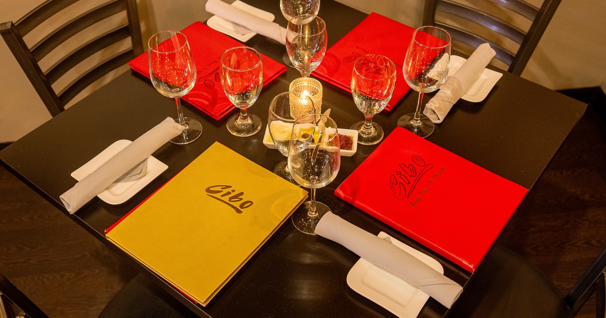 Dining table set for four guests
