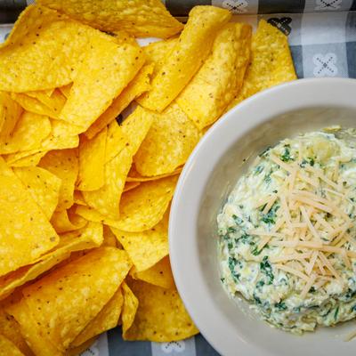 Spinach Artichoke Dip with tortilla chips.