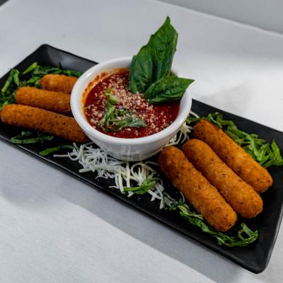 Fried mozzarella sticks with marinara.
