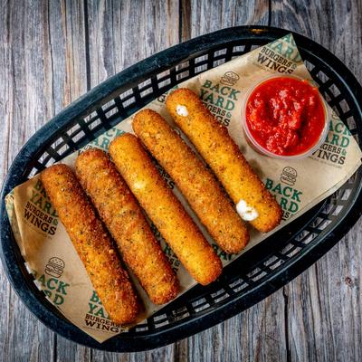Mozzarella sticks with marinara sauce.
