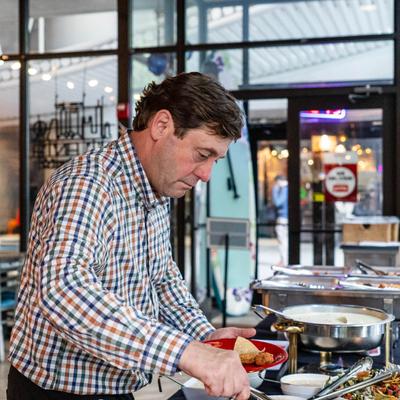 A person choosing food.