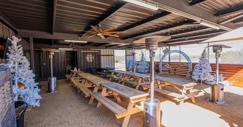 Covered patio, seating area with picnic tables