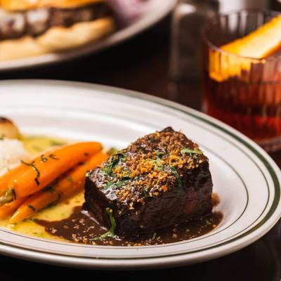 Slow-braised beef, carrots, pearl onions, mustard mousse, red wine reduction & baguette crumbles.