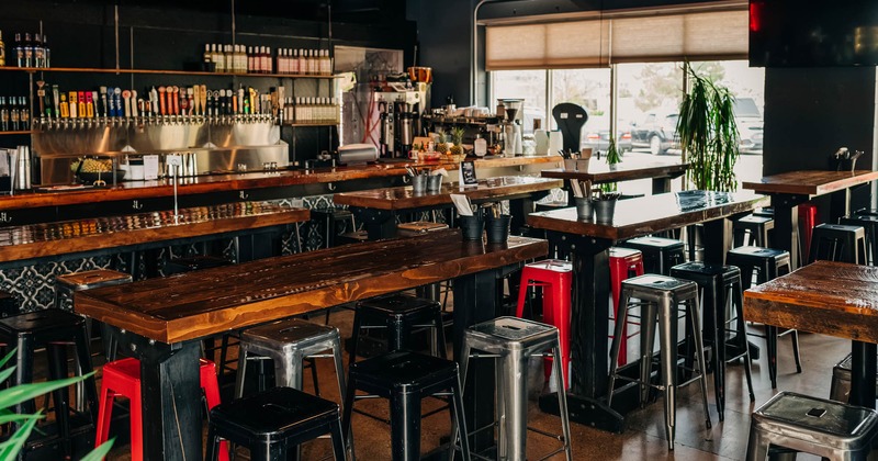 Interior, tables and seating near the bar