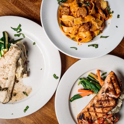 Multiple food plates, top view.