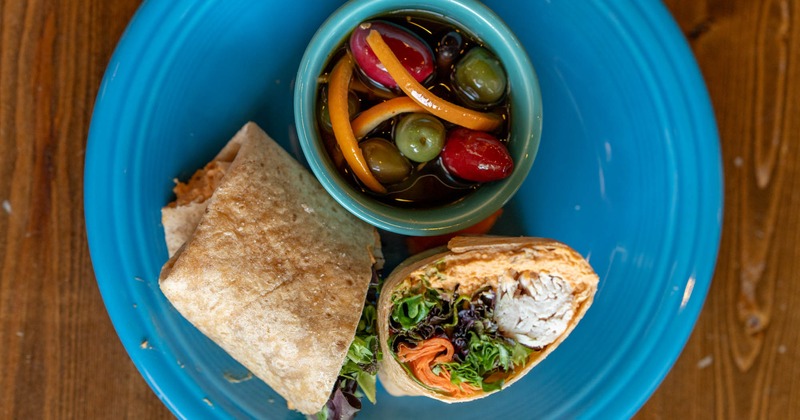 Turkey and hummus wrap with a salad