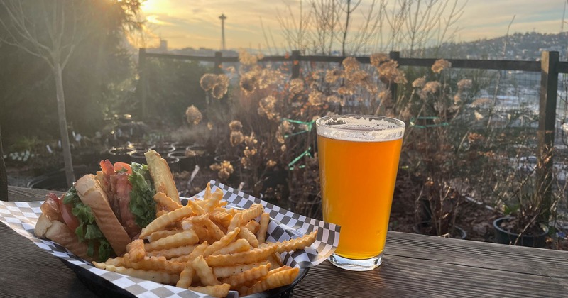 Big sandwich and a glass of beer