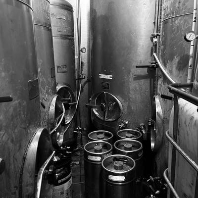 three 200 gal beer serving tanks in beer cooler.
