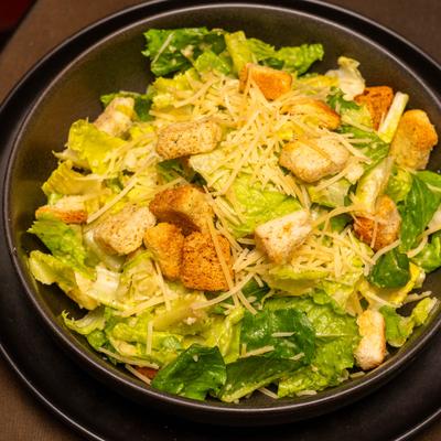 Bowl of Caesar salad.