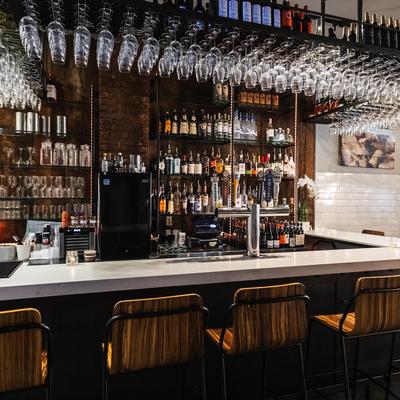 The serving counter and stools.