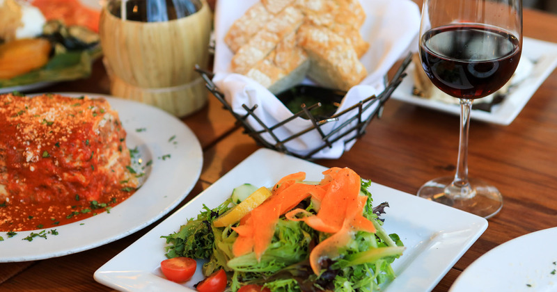 Various dishes served with wine