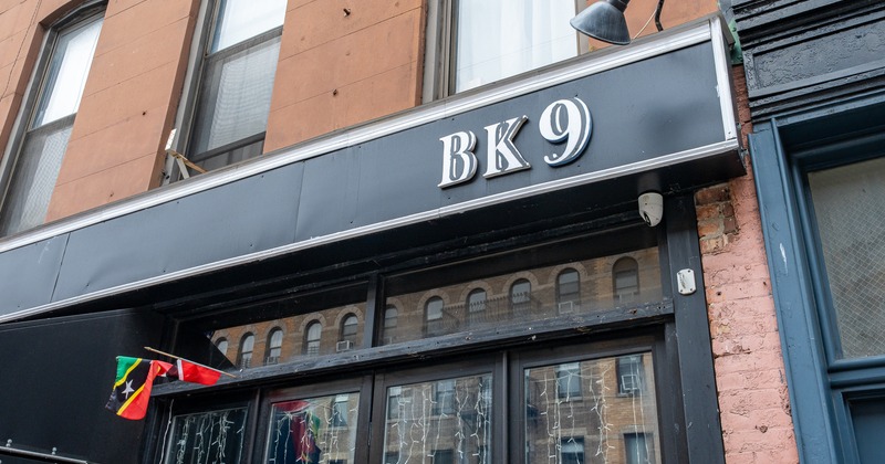 Entrance, to restaurant, sign above