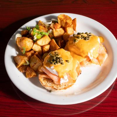 Smoked Salmon Benedict served with home fries.