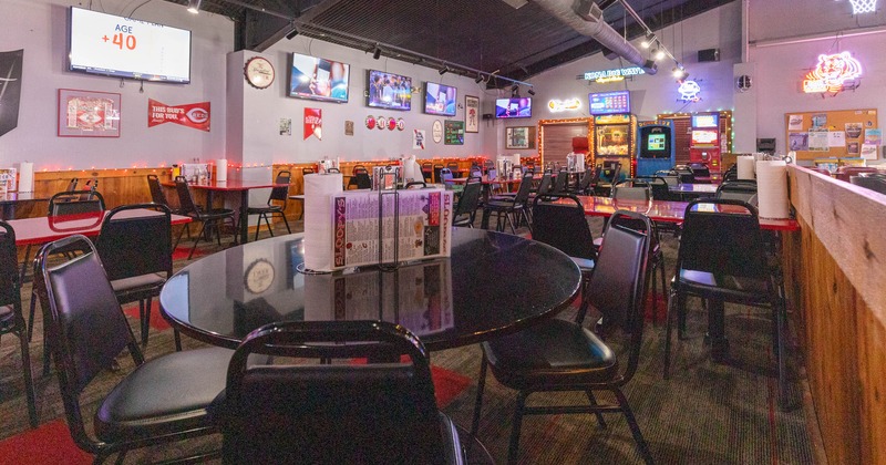 Interior, tables and chairs in dining area