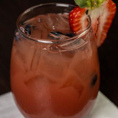 White sangria garnished with a strawberry
