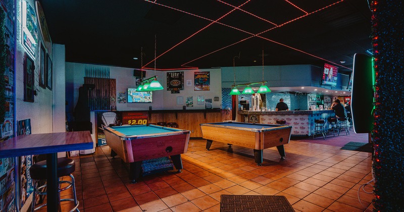 Interior, a pool tables near a bar