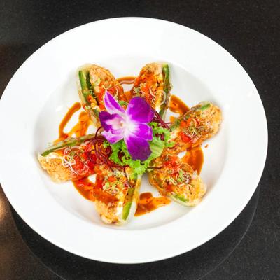 Deep fried jalapenos, topped with spicy tuna, cream cheese, and sauces.