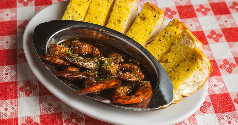 Shrimp sauteed in Worcestershire sauce, served with garlic bread