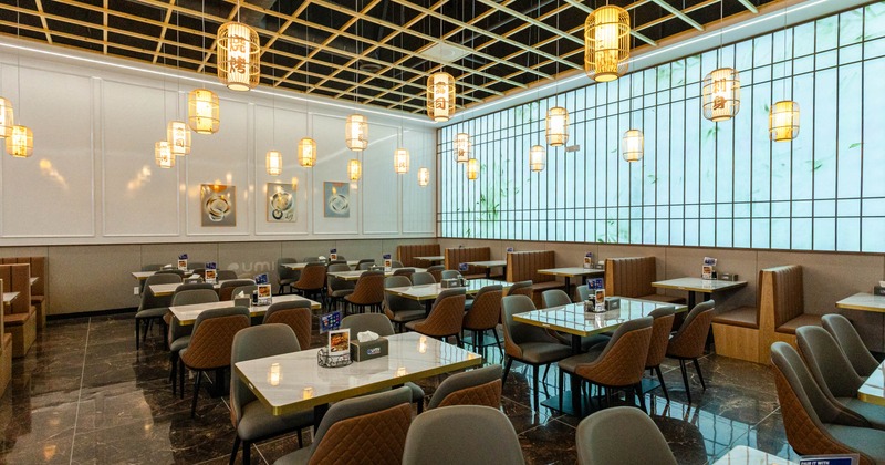 Interior, tables and chairs ready for guests