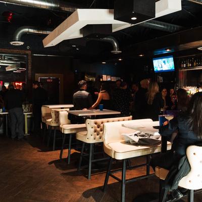 Interior with stylish white tufted seating.