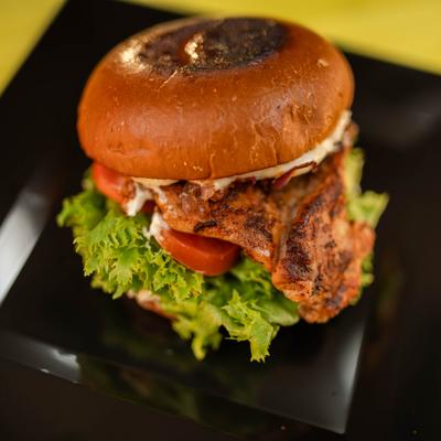 Grilled Chicken Sandwich with lettuce, tomato and cheese.