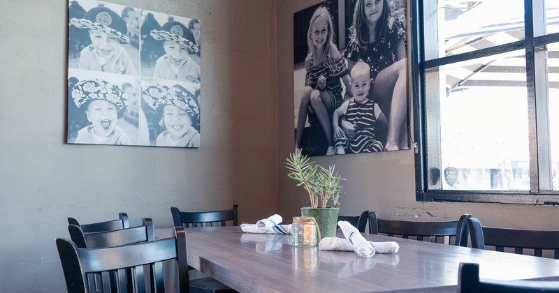 Interior, tables and chairs near window
