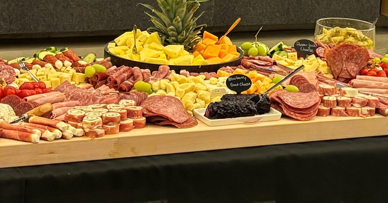 Charcuterie display with meats, cheeses and fruits