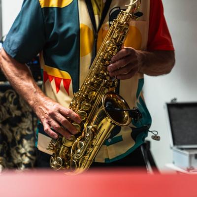 Person playing saxophone.