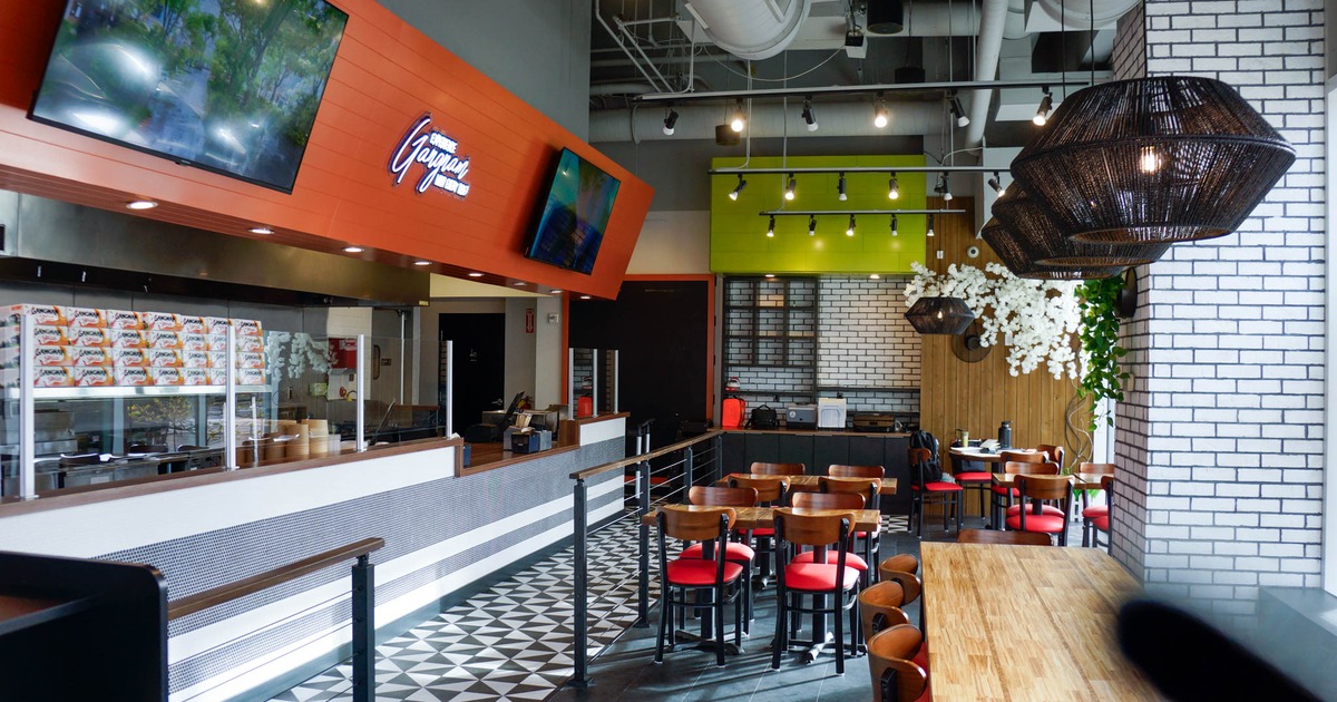 Interior, dining area, tables with chairs, ready for guests, checkout counter on the left