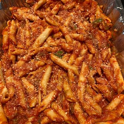 Penne pasta in marinara sauce.