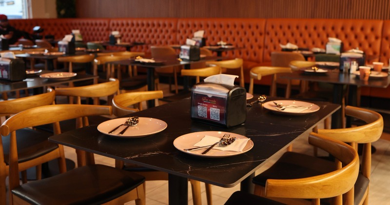 Interior, dining space with tables and chairs