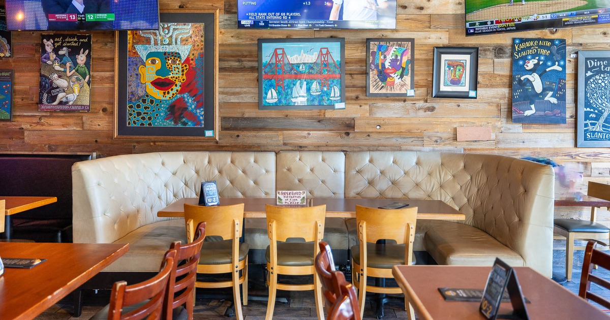 Interior, leather couch with table and chairs ready for guests