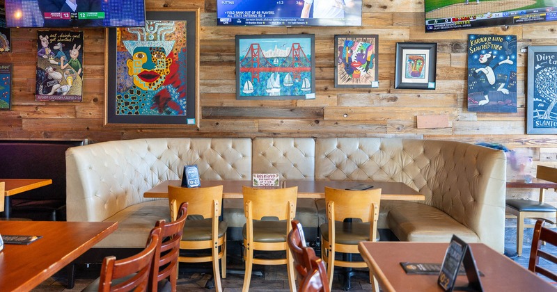 Interior, leather couch with table and chairs ready for guests