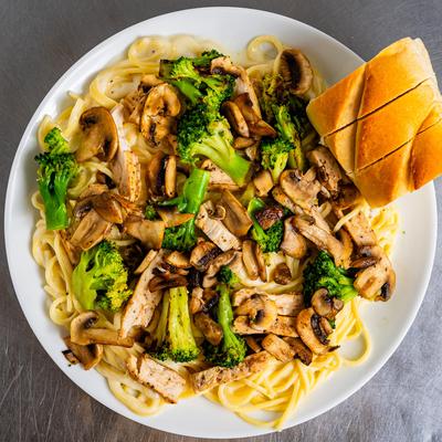 Spaghetti Alfredo, with chicken, mushrooms, and broccoli.