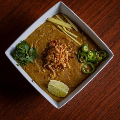 Goat Curry, with jalapenos, lime, herbs, and spices.